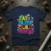 Eat Sleep Build Repeat text design with gears and construction elements on a navy t-shirt