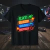 Eat Sleep Dash Repeat neon text graphic with game icons on a black t-shirt, perfect for gamers