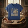 Eat Sleep Eat Sleep Bourbon text with a bourbon barrel graphic on a navy blue t-shirt