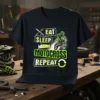 Eat Sleep Motocross Repeat graphic tee with a motocross rider and dirt bike illustration