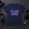 Eat Sleep Oueef Repeat text design with neon blue and pink glowing letters on a navy t-shirt, featuring small yellow