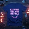 Eat Your Girl Out Or I Will quote in neon-style lettering on a blue t-shirt design