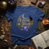 Eclectic Witch t-shirt with a black cat on books under a crescent moon and celestial graphics