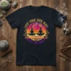 T-shirt design with "Eff You See Kay Why Oh Whiz" text and two people meditating, surrounded by floral and sunset