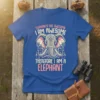 Blue t-shirt with text "ELEPHANTS ARE AWESOME I AM AWESOME THEREFORE I AM A ELEPHANT" and a graphic of an