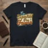 En Español Por Favor text design on a navy t-shirt with vintage retro styling