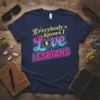 Everybody Knows I Love LESBIANS text design with a heart and lightning bolt, rainbow colors, on a navy t-shirt