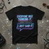 Black t-shirt with neon pink and blue text: "EVERYONE WAS THINKING IT. I JUST SAID IT." featuring a circuit board
