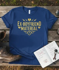 Blue t-shirt with gold glitter text "EX-BOYFRIEND MATERIAL" and lightning bolt graphics