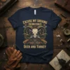 Excuse My Driving I Was Looking For Deer And Turkey quote t-shirt with ram skull and shotguns graphic