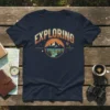 Navy t-shirt with "Exploring" text and a circular graphic of mountains, river, and trees