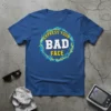 Blue t-shirt with "EXPRESS YOUR BAD FACE" in bold white and yellow text within a circular graphic design