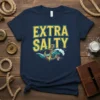 Navy blue t-shirt with "Extra Salty" text in yellow and blue, featuring an anchor, waves, and a skull graphic