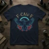 F-CAW-F text above a detailed raven graphic with outstretched wings and red flowers, on a navy t-shirt