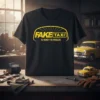 Black t-shirt with yellow "Fake Taxi No Money? No Problem." text design, featuring retro taxi logo and slogan