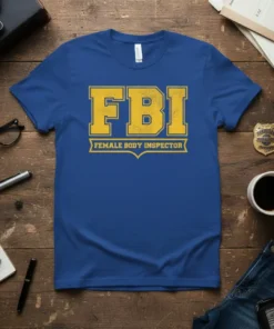 FBI Female Body Inspector t-shirt with bold yellow text on a royal blue shirt, featuring distressed vintage lettering