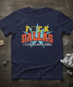 Navy blue t-shirt with bold yellow and orange text saying "F*CK DALLAS I'D LIKE TO BUY A VOWEL" in a