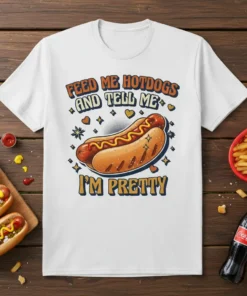 Feed Me Hotdogs And Tell Me I'm Pretty quote on a white t-shirt with a retro graphic of a hotdog