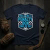 T-shirt with blue and white text "FEELS LIKE A PENALTY BOX KIND OF DAY" and hockey stick graphics