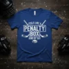 Blue t-shirt with white distressed text "Feels Like A Penalty Box Kind Of Day" and hockey graphics, including crossed sticks
