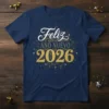 Feliz Año Nuevo 2026 text design with gold glitter accents and starbursts on a navy t-shirt