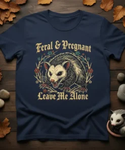 Feral & Pregnant Leave Me Alone text with an opossum graphic on a navy t-shirt