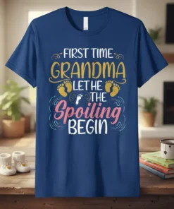 First Time Grandma Let The Spoiling Begin quote with baby footprints graphic on a navy blue t-shirt