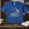 Fits Purrrfectly quote with a cute tabby cat sitting in a decorative teacup on a royal blue t-shirt