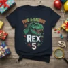 FIVE-A-SAURUS REX 5 t-shirt with a green T-Rex head and birthday decorations, designed for a 5th birthday