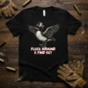 Goose with knife in mouth and wings spread, text "FLOCK AROUND & FIND OUT" below, on a black t-shirt