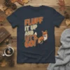 Fluff It Up And Let's Go! text with a jumping fox graphic on a navy t-shirt