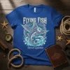 Flying Fish Ocean Legends t-shirt design featuring a detailed flying fish illustration with waves and Celtic knotwork