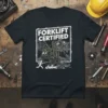 Forklift Certified t-shirt with cartoon illustration of a forklift carrying people and falling figures