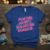 Foster Adopt Volunteer Donate text with paw print graphic on a royal blue t-shirt, promoting animal rescue efforts