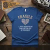 T-shirt with "FRAGILE I JUST DROPPED MY DAUGHTER OFF AT COLLEGE" text and a heart graphic