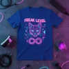 Freak Level neon cat graphic tee with geometric design and infinity symbol, vibrant pink and blue colors