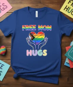 Free Mom Hugs t-shirt with a rainbow heart held by hands, celebrating LGBTQ+ pride and maternal love