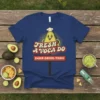 Fresh A Voca Do 24HR Drive-Thru text with a chef avocado graphic on a blue t-shirt