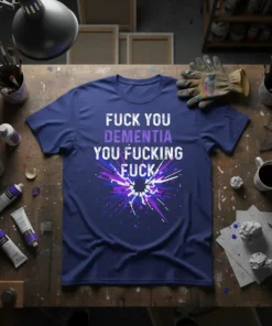 T-shirt with "FUCK YOU DEMENTIA YOU FUCKING FUCK" text in white and purple, featuring a colorful abstract splash graphic