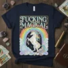 Fucking Magical t-shirt with a white unicorn rearing in front of a pastel rainbow and clouds, featuring bold typography