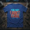 Blue t-shirt with "FUN FACT I DON'T CARE" in fiery orange text over a circuit board pattern