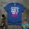 Blue t-shirt with white text saying "NO ONE PREPARES YOU FOR THE TRANSITION FROM MA-MA TO MOMMY TO MOM TO