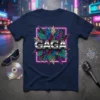 GAGA text graphic with colorful abstract shapes and neon pink border on a navy t-shirt