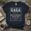 Navy t-shirt with "GAGA Like a Grandmomher, only way cooler" text in vintage style font. Includes definition and synonyms
