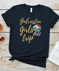 Galveston Girls Trip 2022 text with a retro sunset wave graphic on a navy t-shirt