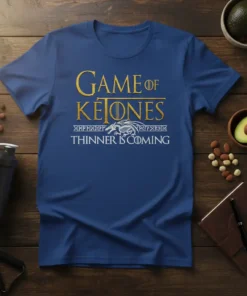 Blue t-shirt with "GAME of KETONES THINNER IS COMING" text and a dragon skeleton graphic