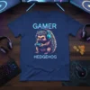 Gamer Hedgehog T-Shirt design with a cute hedgehog wearing headphones and holding a game controller, text reads GAMER HEDGEHOG