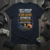 T-shirt with "I DON'T ALWAYS DIE WHEN PLAYING VIDEO GAMES" quote, featuring gamer graphics and humorous text about lag and