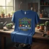 Garden Gangster t-shirt design featuring bold text and potted plants including a Venus flytrap and flowers
