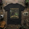 Black cat in a garden with wheelbarrow and text "Gardening Because Murder Is Wrong" on a t-shirt